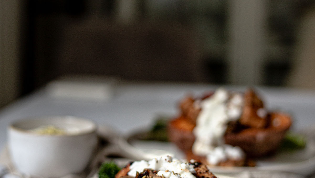 Oven-baked sweet potatoes with tofu and feta cheese